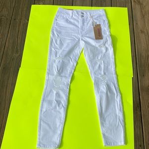 Skinny white jeans distressed